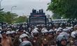 A police anti-riot unit is ready to disperse the protest on February 20, 2023, in Colombo,...