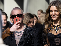 J Balvin and Valentina Fernet are seen at the Dolce &amp; Gabbana fashion show during the Milan Fashion Week Womenswear Fall/Winter 2023/202...