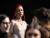 A guest is sean at Dolce &amp; Gabbana fashion show, Milan Fashion Week Womenswear Fall/Winter 2023/2024 (C)Photo: Cinzia Camela. (