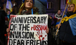 KRAKOW, POLAND - FEBRUARY 24:Members of the Ukrainian diaspora stand outside the Russian...