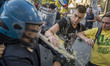 Demonstrators Clash with riot police following a demonstration, organized by antagonist to...