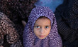 A Muslim Palestinian girl attends Eild al-Adha prayers on Sept. 24, 2015. in Gaza City. Ei...