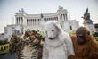 Demonstrators march during a rally calling for action on climate change on November 29, 20...