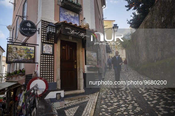 

A person is seen walking in the vicinity of a street market in the historic area of Sintra, Portugal, on March 3rd, 2023. Sintra stands ou...