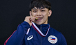 Gold medalist Carlos Edriel Yulo of Philippines poses during the awarding ceremony after t...