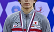 Silver medalist  Kazuki Minami of Japan poses during the awarding ceremony after the men's...