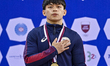 Gold medalist Carlos Edriel Yulo of Philippines poses during the awarding ceremony after t...