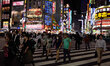 People cross the street at Shinjuko,Tokyo at night on October 13, 2015. Shinjuko is a majo...