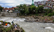 A small group of volunteers worked to clean up styrofoam from the Ciliwung River in Bogor,...