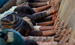 Indian labourers push Pantoon tank to construct pantoon bridge.a temporary bridge over Gan...
