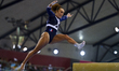 Coline Devillard of France competes during the women's balance beam Final at the 15th FIG...