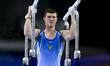  Illia Kovtun of Ukraine  competes during the men's Parallel bars Final at the 15th FIG Ar...