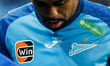 Logos of Spanish manufacturer Joma (C) and FC Zenit (R) are seen on Malcom's shirt during...