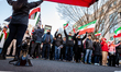 People attend a rally against the Islamic regime in Iran at the US State Department.  Demo...