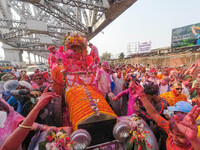 Hindu God Satya Narayan is seen been carried on a vintage Rolls Royce car during Holi festival celebration in Kolkata , India , on 5 March 2...