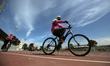 Palestinian women ride bicycles at Gaza City's Yarmouk Stadium on March 7, 2023 a day befo...