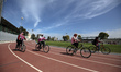 Palestinian women ride bicycles at Gaza City's Yarmouk Stadium on March 7, 2023 a day befo...