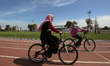 Palestinian women ride bicycles at Gaza City's Yarmouk Stadium on March 7, 2023 a day befo...