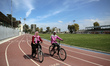 Palestinian women ride bicycles at Gaza City's Yarmouk Stadium on March 7, 2023 a day befo...