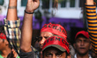 Anti-government demonstrators and university students participate in a protest  demanding...