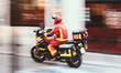 A BSPP firefighter equipped with the MIR (Moto d'Intervention Rapide) drives at high speed...