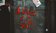 The message ''No to the SNU'' (Universal National Service), which the government plans to...