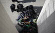 Riot police clears the entrace of the building where members of the Victims' Mortgage Plat...