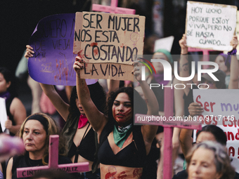 March 8, 2023, Playa del Carmen, Mexico: Women join the march to commemorate International Women's Day on Fifth Avenue. on March 8, 2023 in...
