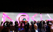Congress visitors passing by the entrance of the Nokia stand that featured the new redesig...