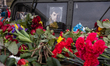Portrait of military commander Dmytro Kotsiubailo on the hood of a military vehicle that s...