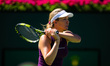 Danielle Collins of the United States in action during the first round of the 2023 BNP Par...