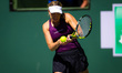 Danielle Collins of the United States in action during the first round of the 2023 BNP Par...