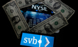 A photo illustration of the logo of Silicon Valley Bank with the NYSE and dollars in the b...