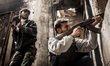 Aleppo, Syria, 2012-10-23, Old City District.
A Free Syrian Army fighter shooting against...