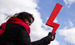 A woman holds Women Stike symbol while attending an annual 'Silesian Manifa' march in Kato...