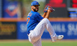New York Mets starting pitcher Joey Lucchesi (47) throws during the seventh inning of a ba...