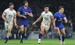 L-R Francois Cros of France  England's Marcus Smith and Antoine Dupont of France during th...