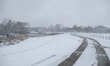 Urban and natural environment landscape as seen covered by a a snow blanket near park Meer...