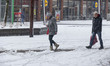 People seen walking on the snow during the freezing day. Blizzard hits the Netherlands and...