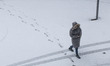 People seen walking on the snow during the freezing day. Blizzard hits the Netherlands and...