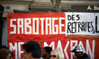Banner reading 'Sabotaging the pensions'. France's labour unions and left parties led a 8t...