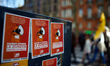 Stickers read 'Macron attacks, Youth counter attack !' France's labour unions and left par...