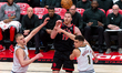 Jakob Poeltl #19 of the Toronto Raptors passes the ball to other player during the Toronto...