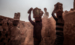 Dhaka, Bangladesh – A worker is taking a nap in the brickfield. The world is going through...