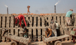Dhaka, Bangladesh - Workers are working in Brickfield. The world is going through a speedy...