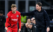 Oliver Glasner manager of Eintracht Frankfurt consoles Christopher Lenz of Eintracht Frank...