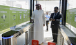 Customers entering through the entrance after opening Qatars first fully autonomous and ch...
