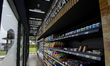 Shelves of groceries stand in the Qatars first fully autonomous and checkout-free Al Meera...