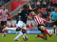 Luton Town's Amari'i Bell is challenged by Sunderland's Luke O'Nien during the Sky Bet Championship match between Sunderland and Luton Town...