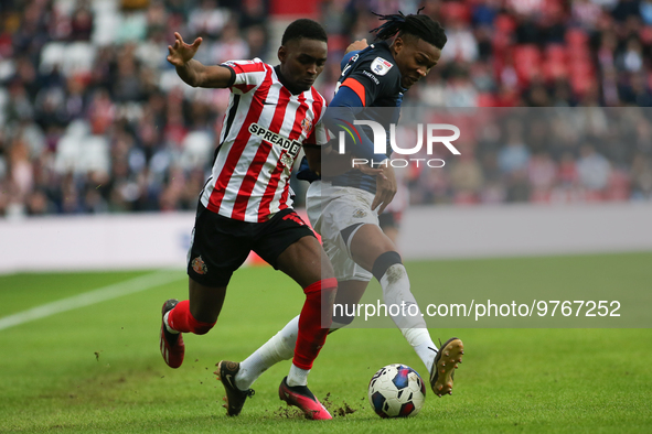 Sunderland's Abdoullah BA takes on Luton Town's Gabriel Osho during the Sky Bet Championship match between Sunderland and Luton Town at the...